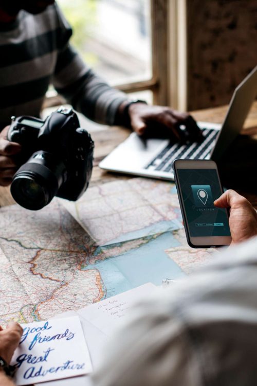 men-planning-the-journey-with-map-and-gps-P5LY3AR-scaled.jpg